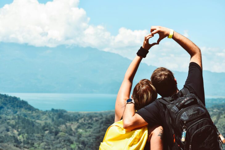 Two People Forming Heart Hand Shape