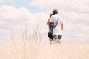 couple hugging outdoors