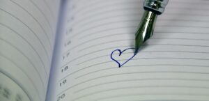 calendar page with a heart shape drawn on it