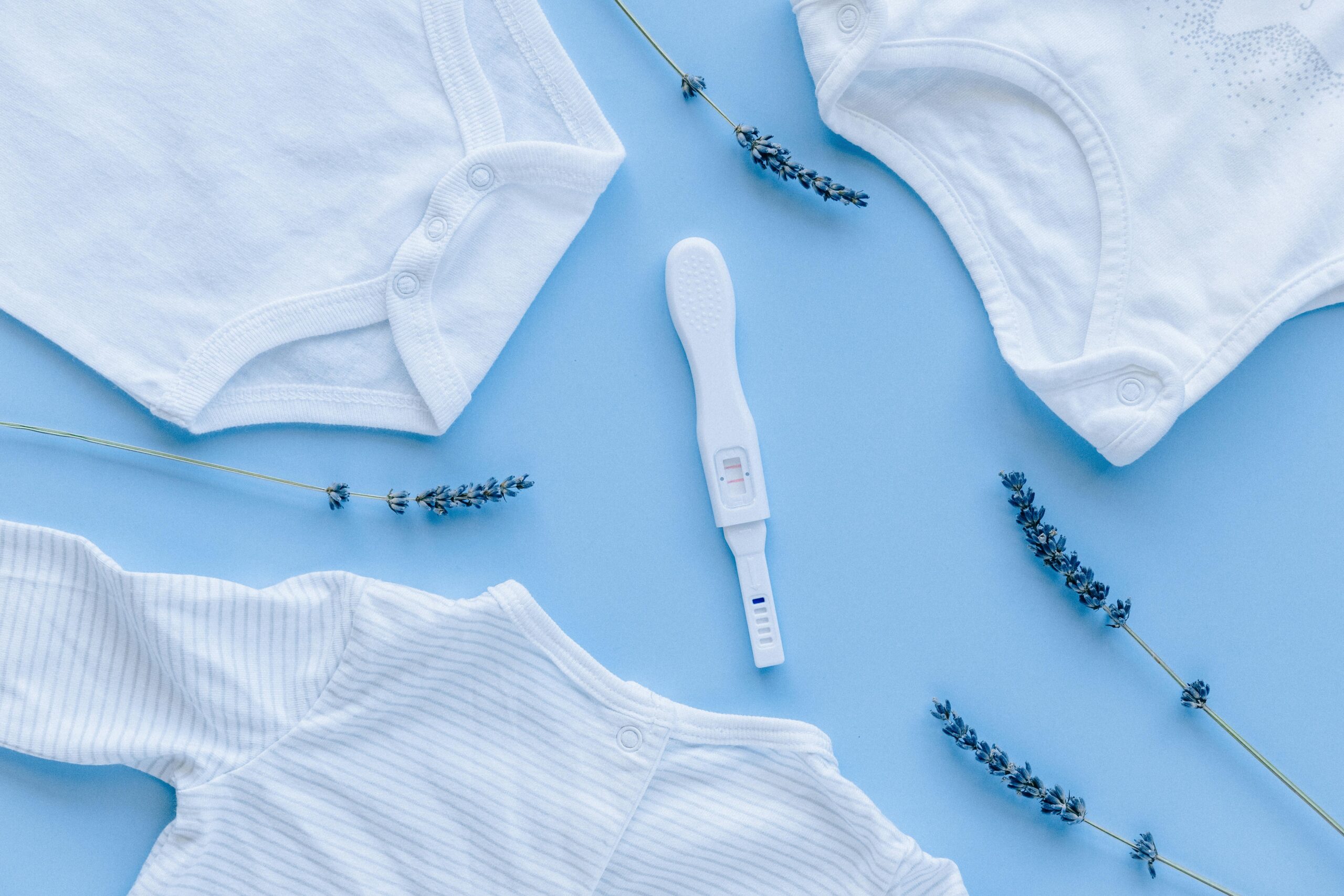 Blue and White Crew Neck Shirt and pregnancy's test kit
